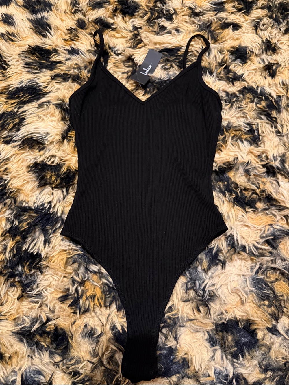 Lulu's Black Ribbed V-Neck One-Piece Bodysuit
